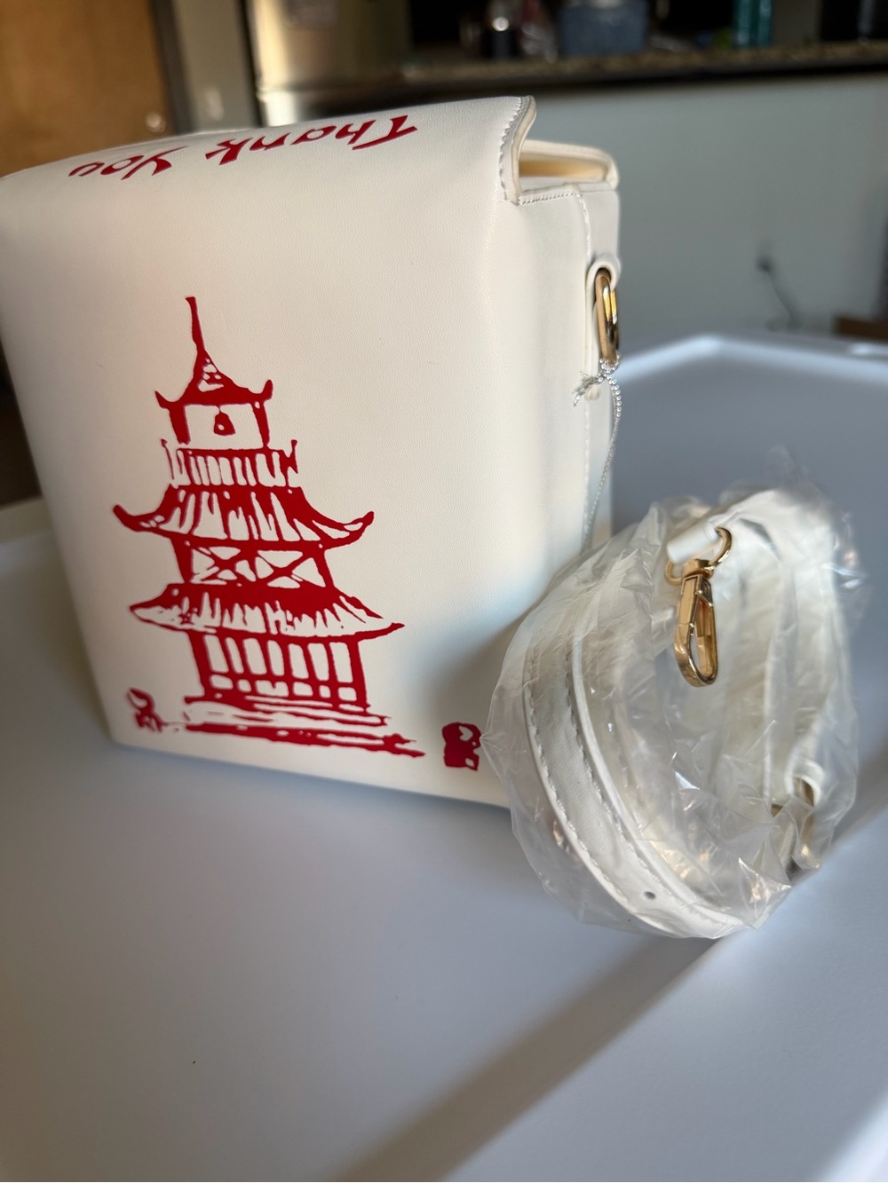 White Crossbody Bag with Red Pagoda Illustration